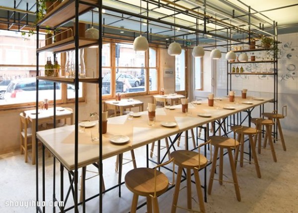 OPSOs restaurant design with solid wood furniture and industrial iron bars