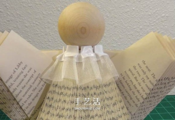 Christmas Angel Book Ornament DIY, a very creative reuse of old books