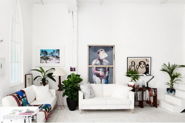 The chocolate factory was transformed into an all-white dream house and studio