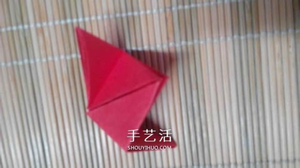 Illustration of the origami method of a lotus that is about to fully bloom