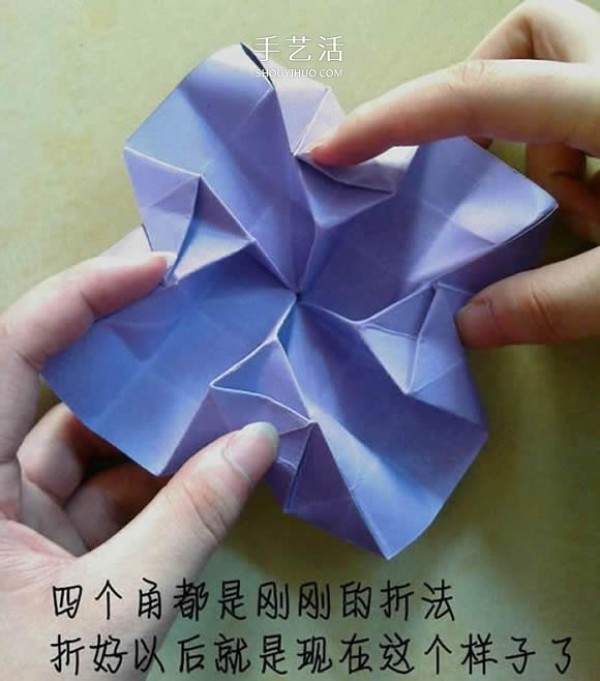 The process of folding an origami Kawasaki rose with a flower center