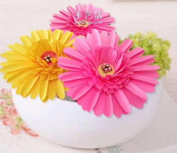 Illustration of beautiful three-dimensional daisy made by hand with colored paper