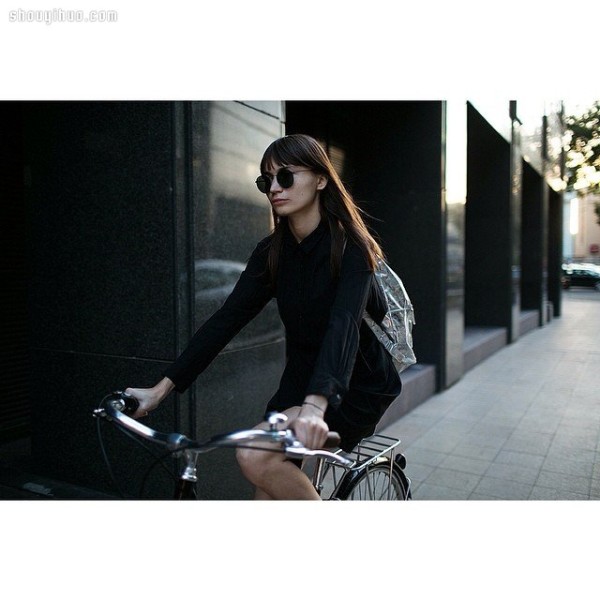 Moscows stylish bicycle girl travels elegantly in the urban area