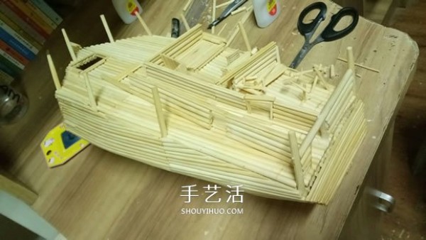 The ancient warship model is hand-made with disposable chopsticks