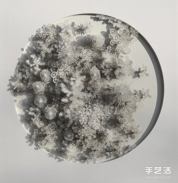 Three-dimensional paper sculptures inspired by bacteria, crystals, etc.