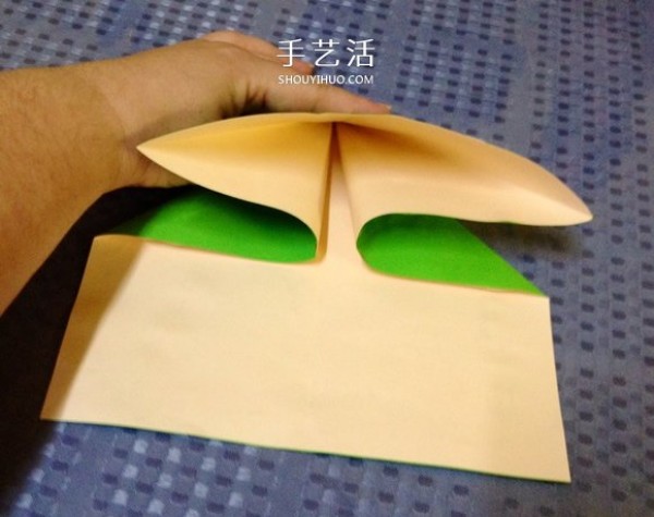 Detailed step-by-step illustration of a simple origami frog