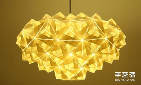 The New London Origami Queen creates artistic origami for three-dimensional lamps and furniture