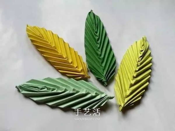 How to fold a simple leaf, illustrated by childrens handmade three-dimensional leaf folding method