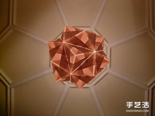 The New London Origami Queen creates artistic origami for three-dimensional lamps and furniture