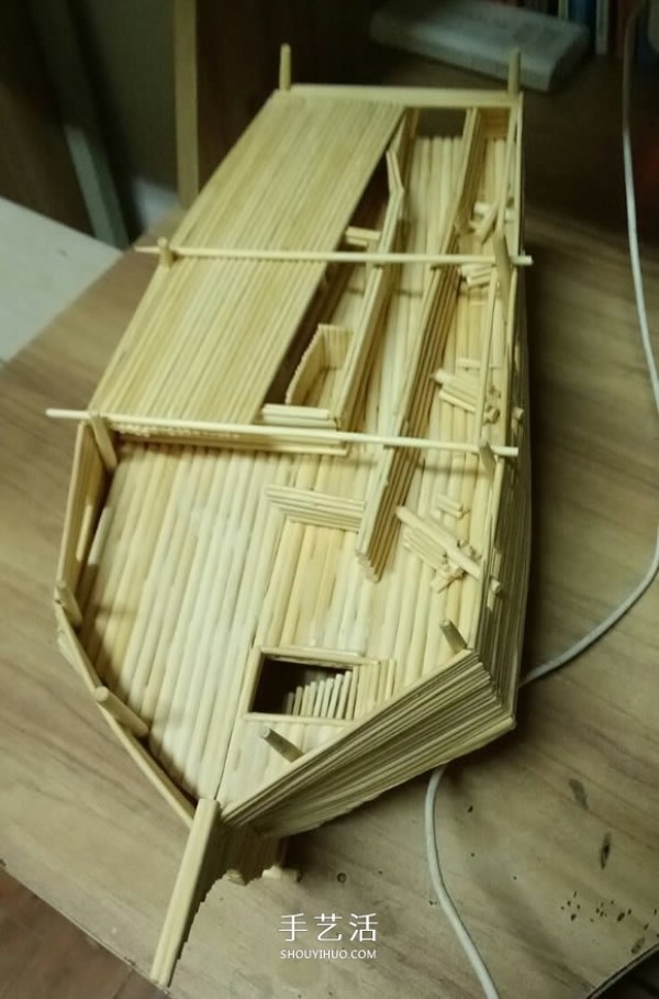 The ancient warship model is hand-made with disposable chopsticks