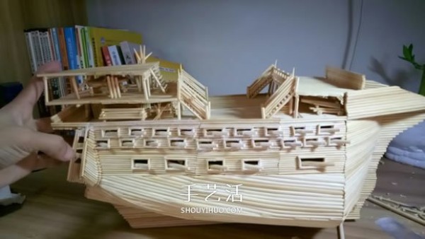 The ancient warship model is hand-made with disposable chopsticks