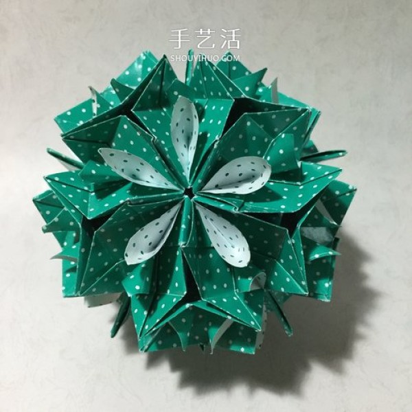 How to fold a five-petal flower ball. How to fold a five-petal flower ball. Origami illustration of a five-petal flower ball