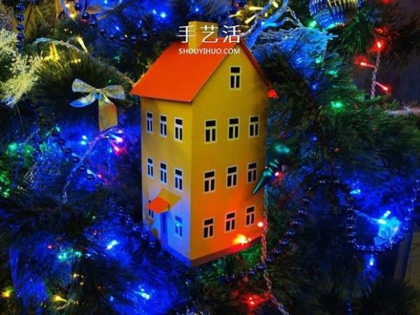 Handmade Christmas house model decoration from cardboard