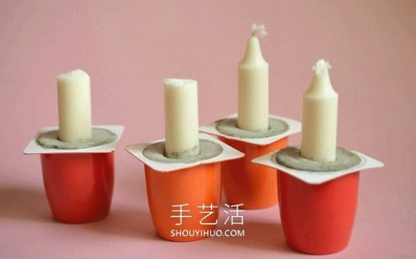 Tutorial on how to make hand-made cement candle holders using yogurt boxes as molds