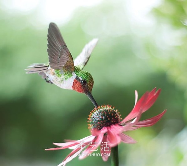 Realistic paper bird sculpture that looks like a photo