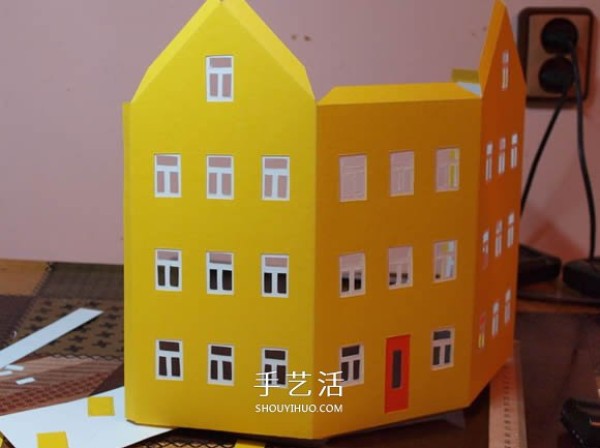 Handmade Christmas house model decoration from cardboard