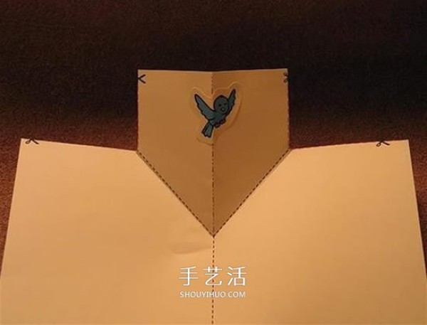 A tutorial on how to make a simple handmade greeting card and a cute bird will jump out when you open it