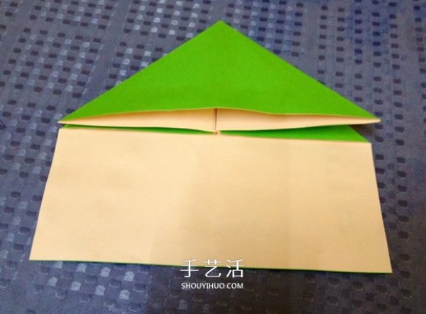 Detailed step-by-step illustration of a simple origami frog