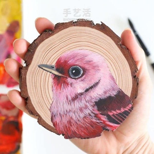 The artist spent 100 days painting 100 species of birds on wood chips