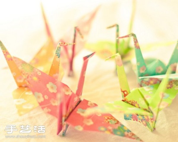 Beautiful paper cranes folded with colored paper