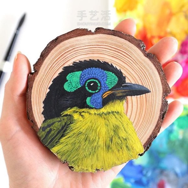 The artist spent 100 days painting 100 species of birds on wood chips