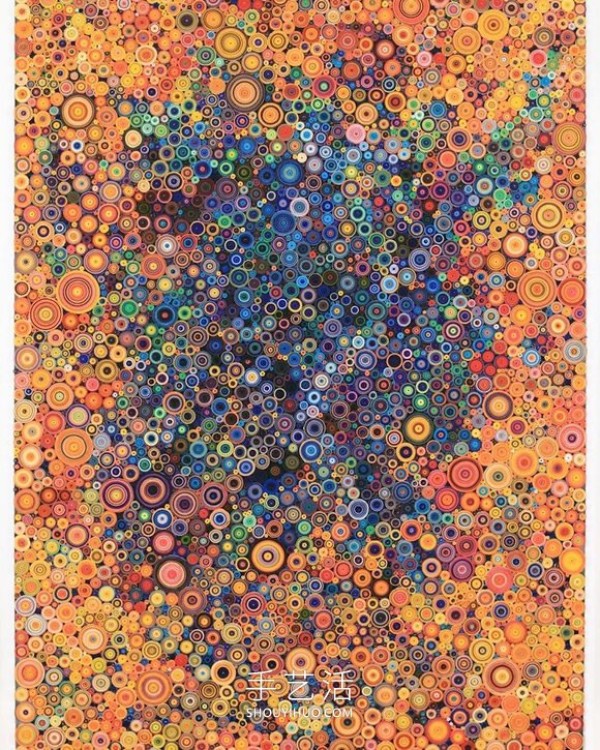 The pattern of the abstract paper painting is like a beautiful kaleidoscope