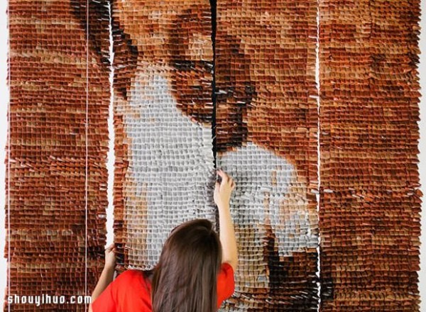 Twenty thousand tea bags create a large portrait of a "Teh Tarik Man" Like