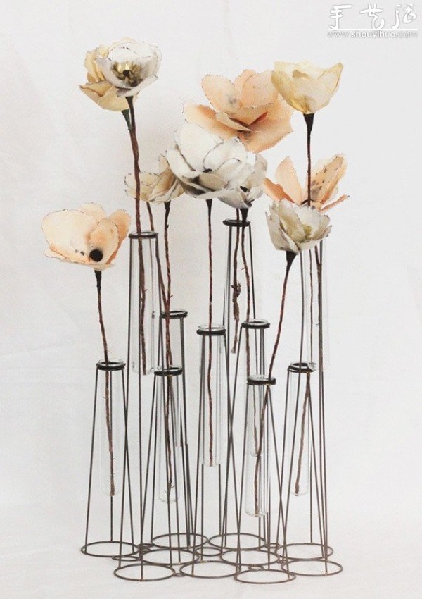 Creative vase made of wire and glass test tubes