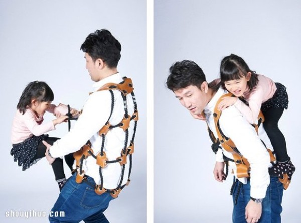 Wearable climbing vest makes dad a big toy for his child! 