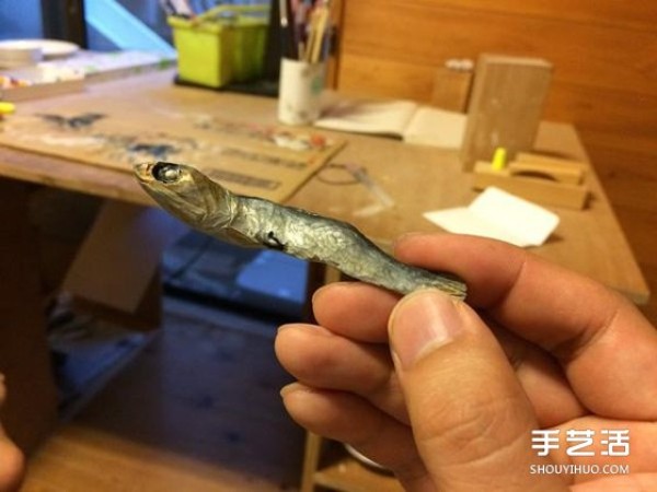 Its so similar! A small wooden carving of dried fish that accidentally broke its teeth