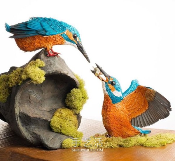 Realistic paper bird sculpture that looks like a photo