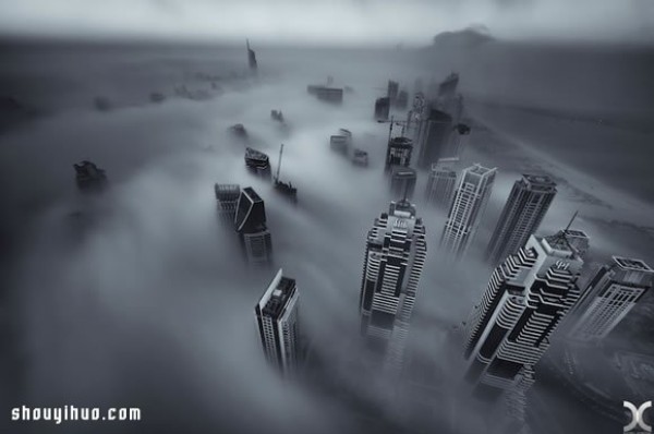 Photography of the city of Dubai on high buildings reveals the city of sky above the clouds and mist