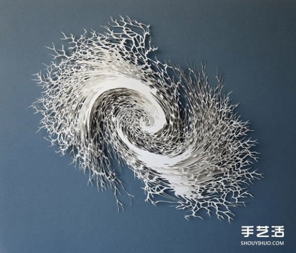 Three-dimensional paper sculptures inspired by bacteria, crystals, etc.