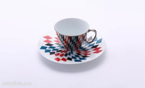 Waltz-like design of mirror-reflected coffee cups and trays of afternoon tea