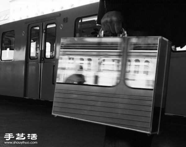 Grape-Asian photographers work: A man and his urban suitcase