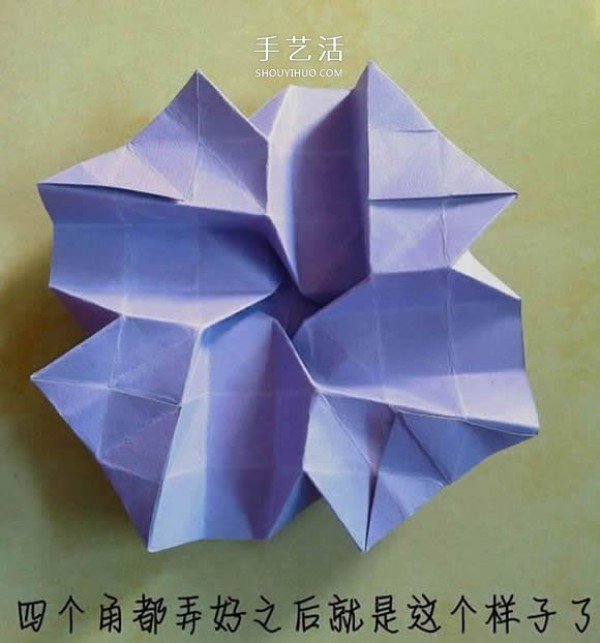 The process of folding an origami Kawasaki rose with a flower center