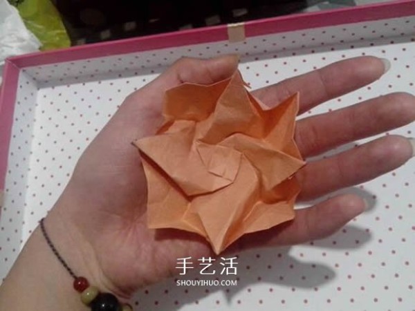 The best introductory tutorial for beginners with detailed illustrations of the Kawasaki rose fold method