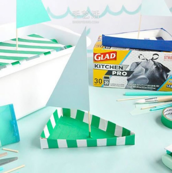 How to make a small boat out of cardboard: How to make a triangular sailboat for children.