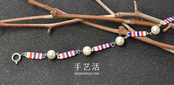 Illustration of a simple homemade pearl bracelet using safety pins to make a bracelet