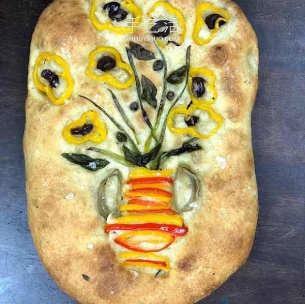 Focaccia bread is used as a canvas to create Van Gogh style art paintings