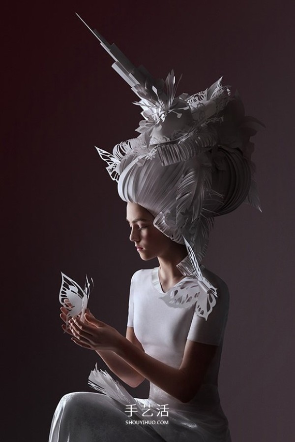 Pictures of paper sculptures of Baroque wigs interpreted by Russian paper sculptors