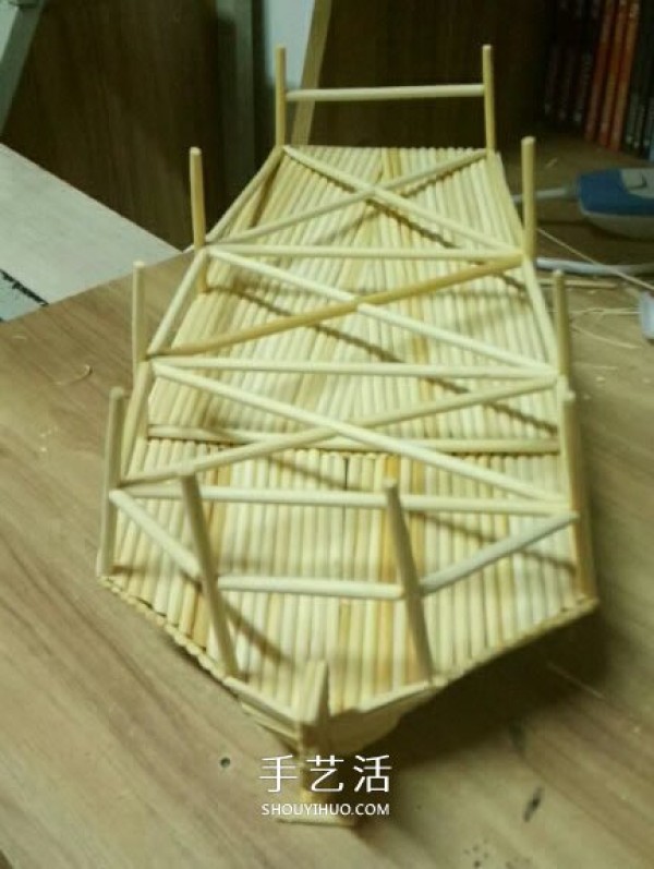 The ancient warship model is hand-made with disposable chopsticks