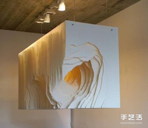 White paper with warm light to DIY a mysterious 3D paper sculpture