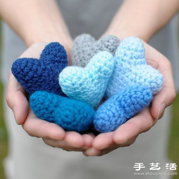 Knitted blue heart-shaped baubles