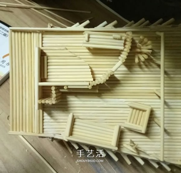 The ancient warship model is hand-made with disposable chopsticks