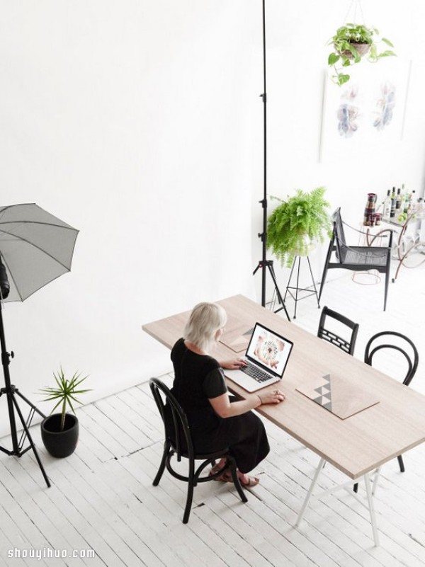 The chocolate factory was transformed into an all-white dream house and studio