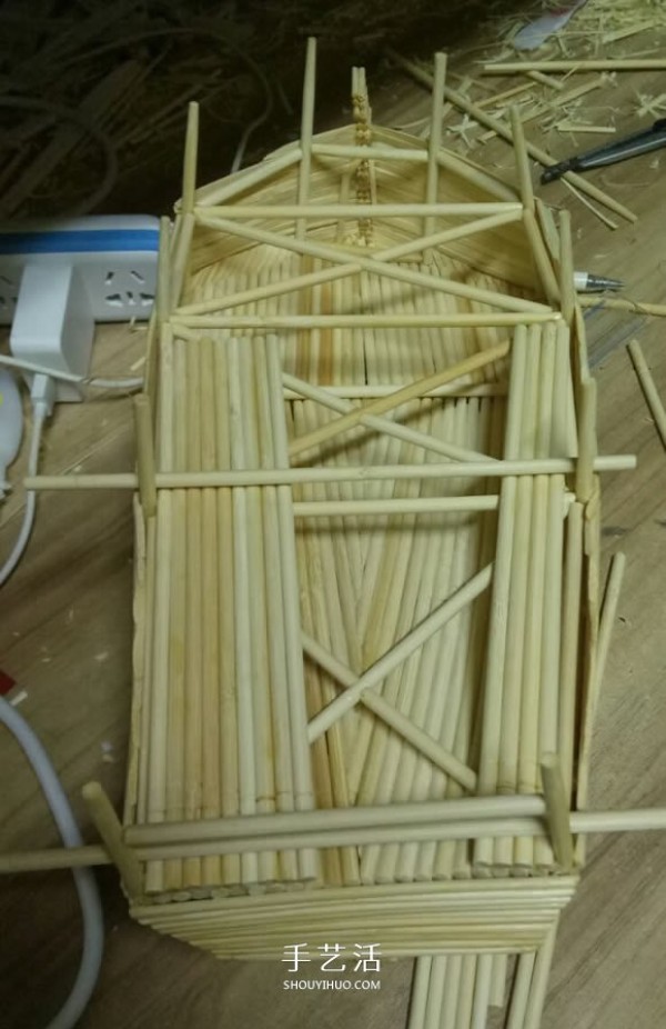 The ancient warship model is hand-made with disposable chopsticks