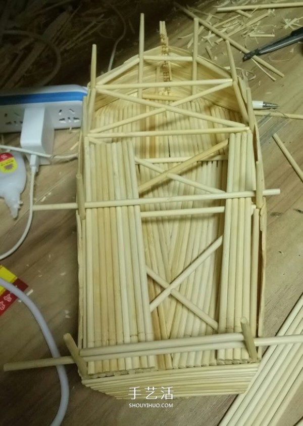 The ancient warship model is hand-made with disposable chopsticks