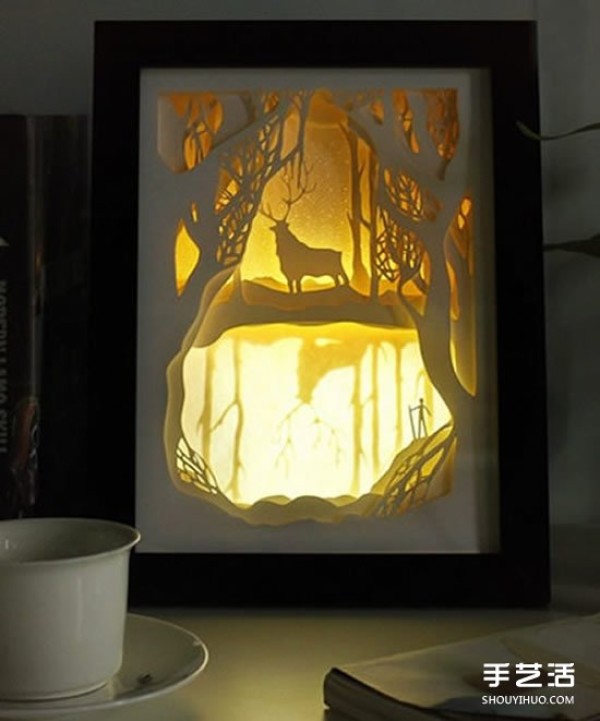 The picture of the exquisite paper carving night light seems to hide the magical fairy tale kingdom