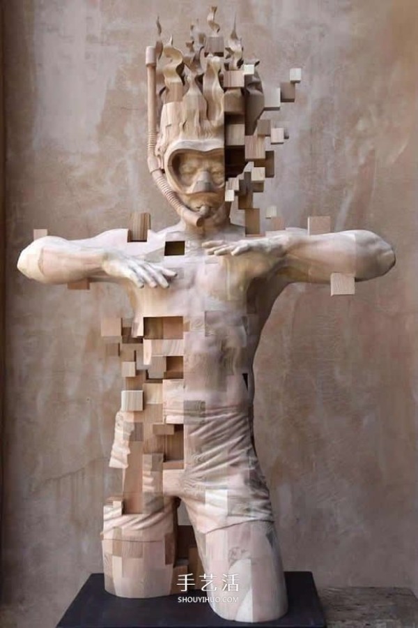 The wooden man is pixelated! The combination of traditional wood carving and digital elements